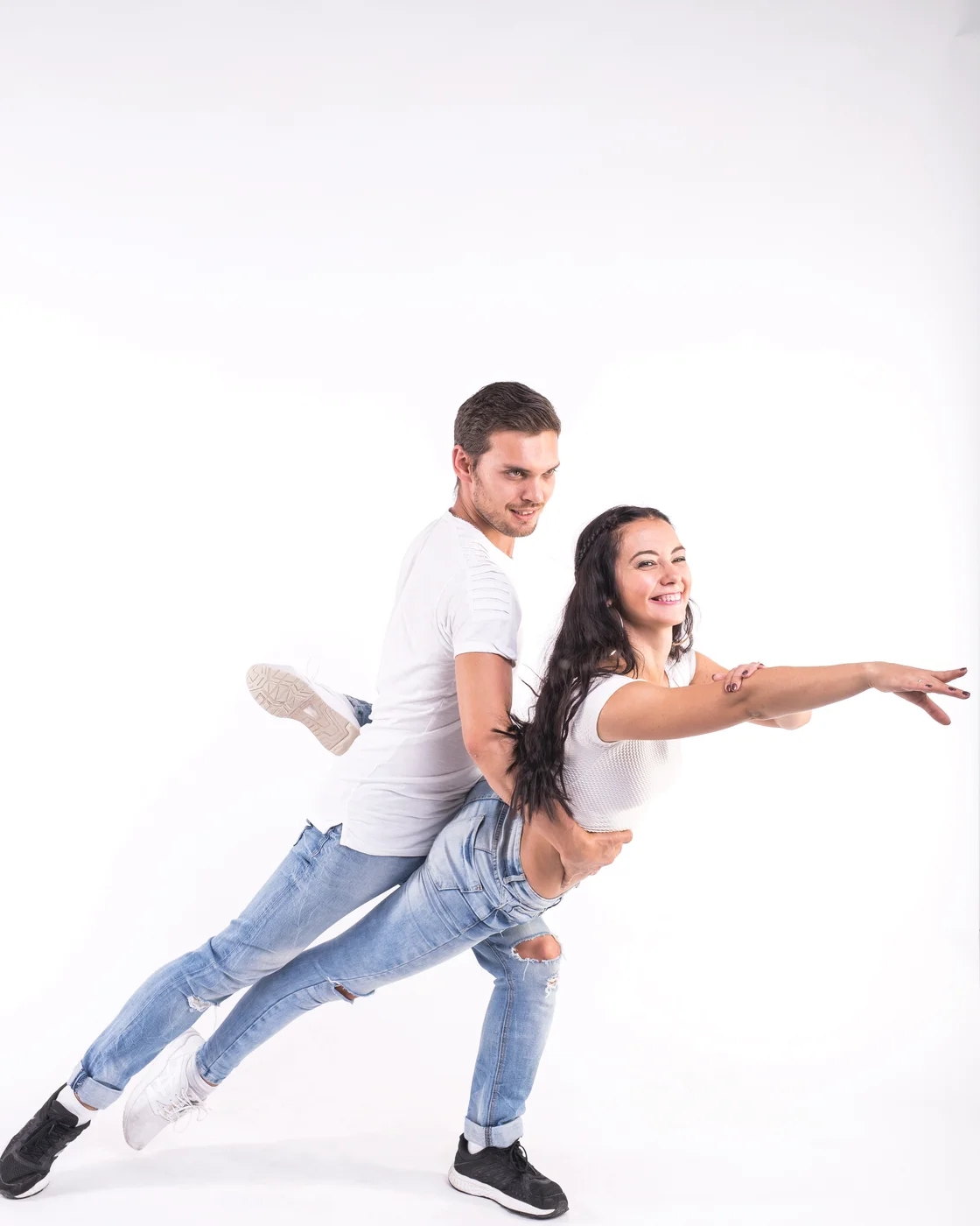 Woman mid-turn in a Qanvero performance top